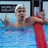 Léon Marchand breaks world record in 200 individual medley in 1 minute, 52.61 seconds