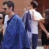 Harry Styles puts on a very cosy display with Zoë Kravitz as he places a cheeky hand on her bottom during stroll in Rome