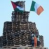 Effigies of rap group Kneecap as well as Irish and Palestinian flags appear on loyalist bonfires in Northern Ireland