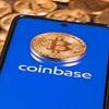 Coinbase surges on S&P 500 debut, but cyber attack dampens share gains